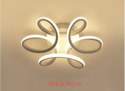 Modern black and white acrylic led ceiling light with a flower-like swirl design by decorbites for bedroom decor