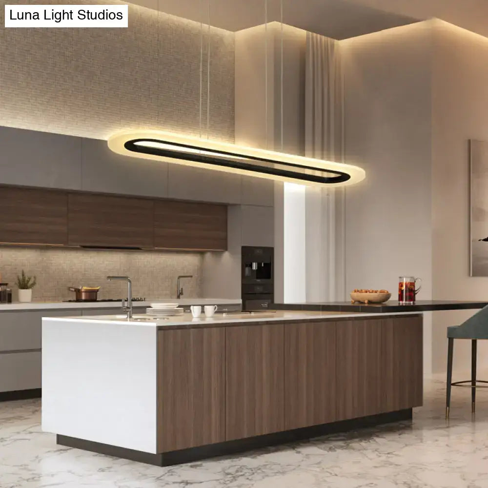 DecorBites™ minimalist LED acrylic oblong light fixture with sleek black frame and warm white illumination, remote control enabled