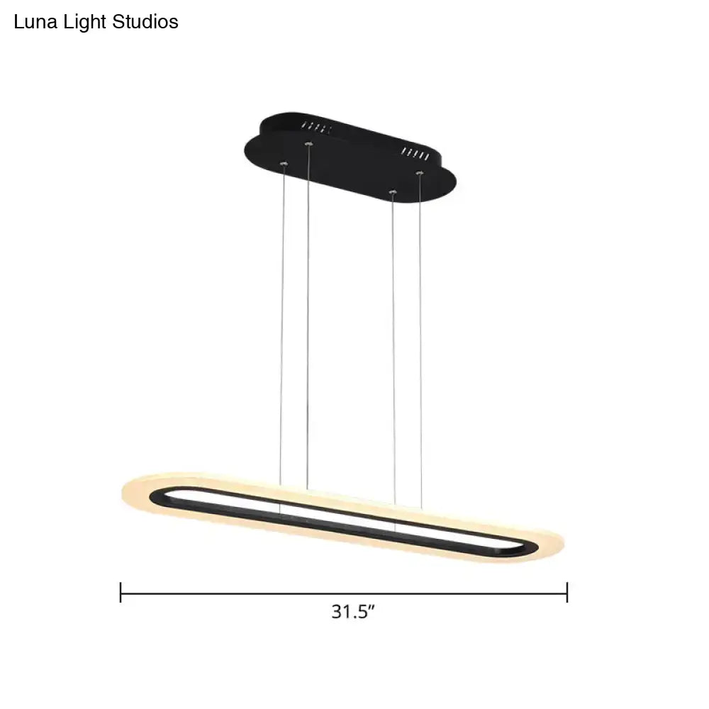 Black and beige acrylic oblong DecorBites minimalist LED light fixture with sleek design and stepless dimming feature