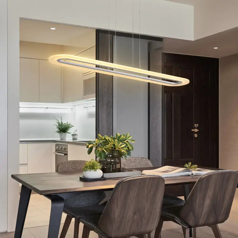 DecorBites™ minimalist LED light fixture with acrylic oblong design and warm glow featuring stepless dimming function