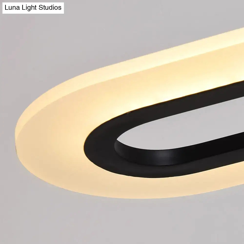 Modern acrylic oblong light fixture with sleek black frame and warm diffused glow compatible with remote control