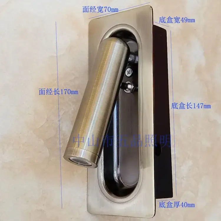 Modern black and white decorbites adjustable bedside led wall lamp with brushed brass cylindrical design and mounting bracket