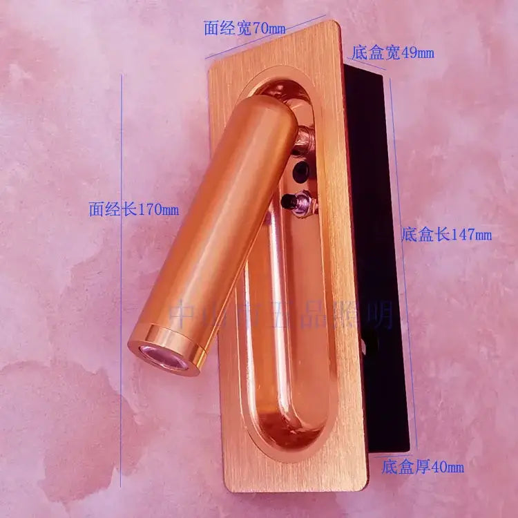 Copper-finished wall lamp with sleek rectangular base and adjustable cylindrical head for decorbites adjustable bedside led use