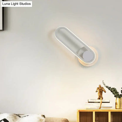 Modern black and white aluminum frame wall lamp with frosted glass and warm white light for bedroom sconce lighting