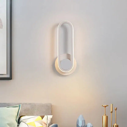 Modern black and white aluminum frame wall lamp with oval design and warm white light for bedroom sconce lighting