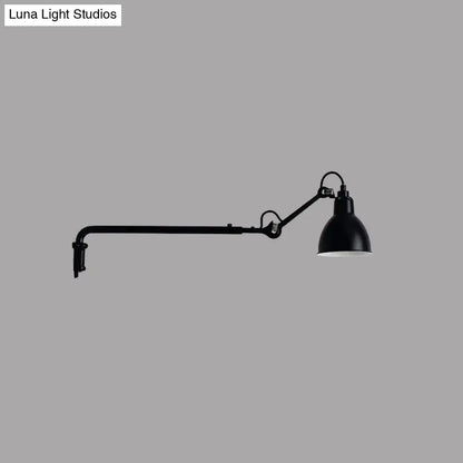 Modern black industrial-style articulated bedroom wall lamp with adjustable head and direct wired electric power source