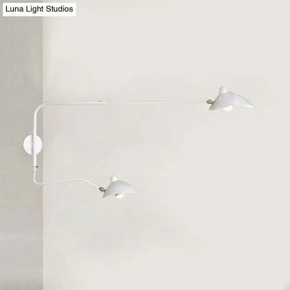 Modern black and white articulated wall sconce with two adjustable arms for living room light fixture