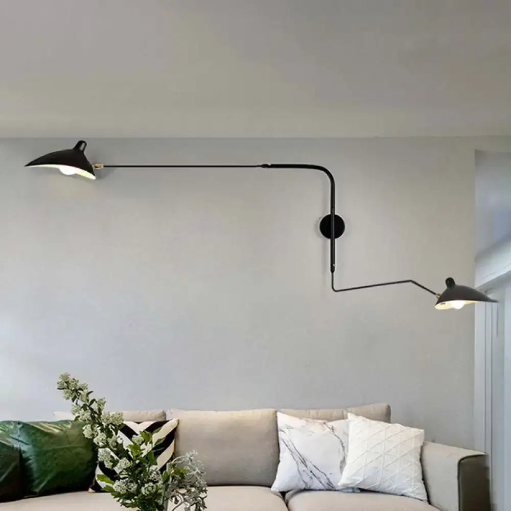 Modern black and white articulated wall sconce with two adjustable arms sleek minimalist light fixture for living room