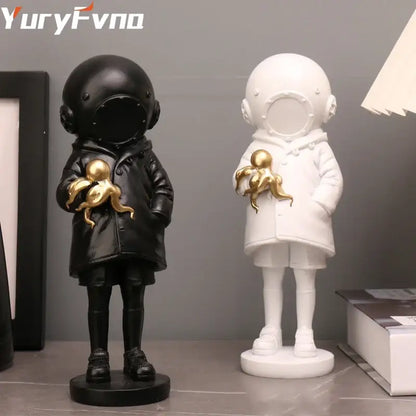 Modern black and white astronaut diver sculpture ornaments holding golden octopus for office decor