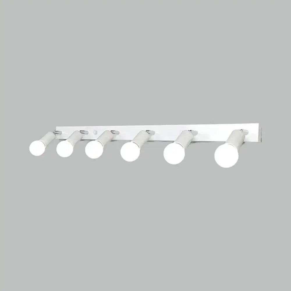 White rectangular wall-mounted bedroom vanity light with five exposed frosted glass bulbs in black and white design