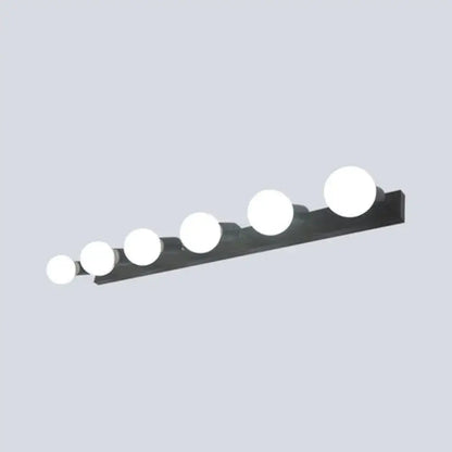 Black rectangular bedroom vanity light fixture with five exposed white bulbs for modern black white decor