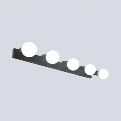 Black rectangular bedroom vanity light with five exposed white bulbs for modern black white decor