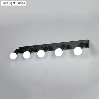 Black metal bedroom vanity light fixture with five adjustable white spherical exposed bulbs in black white design