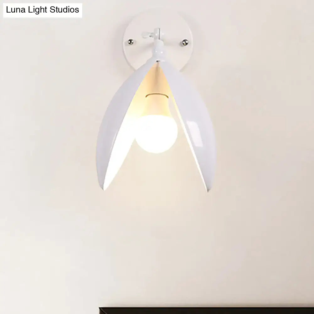 Modern black and white blooming bud wall light with glossy white petal sconce and warm bulb for living room