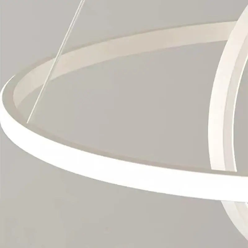 Modern white circular pendant light with sleek minimalist design for living room decorbites circular iron ball pendant