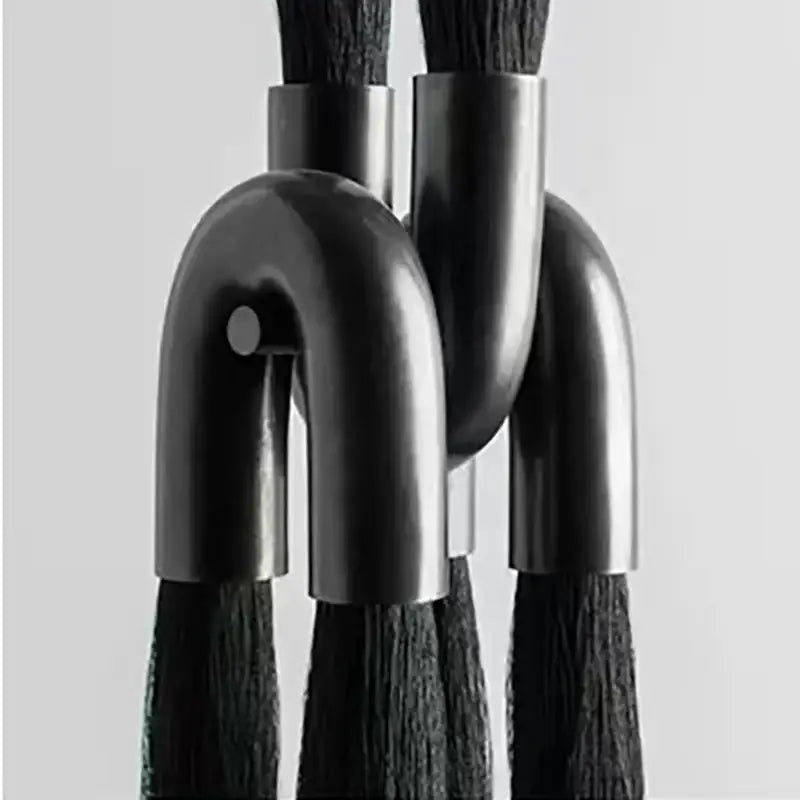 Black brush set with sleek curved metallic handles and dense bristles for decorbites cloth pendant light kitchen decor