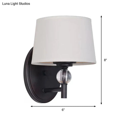 Modern black metal wall sconce with white fabric shade and crystal ball accent compatible with 110v-120v and led lighting