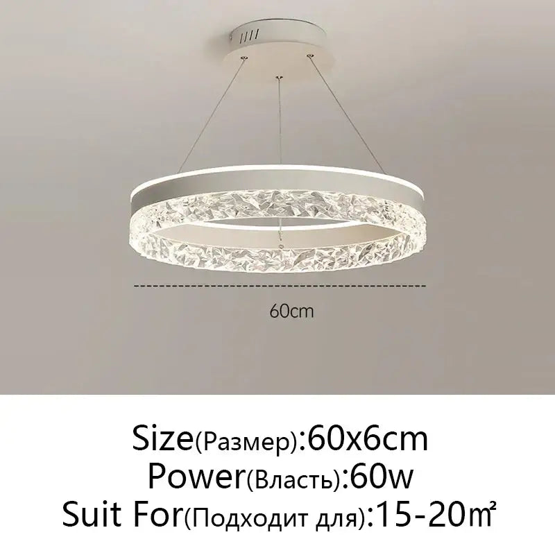 Modern white circular rings led chandelier with textured crystal ring and sleek metallic frame for dining room decorbites crystal rings