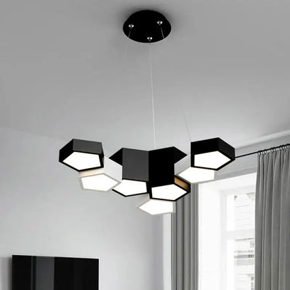 Modern black white diamond led chandelier featuring a hexagonal pendant light with illuminated geometric shades for decorbites black white rooms