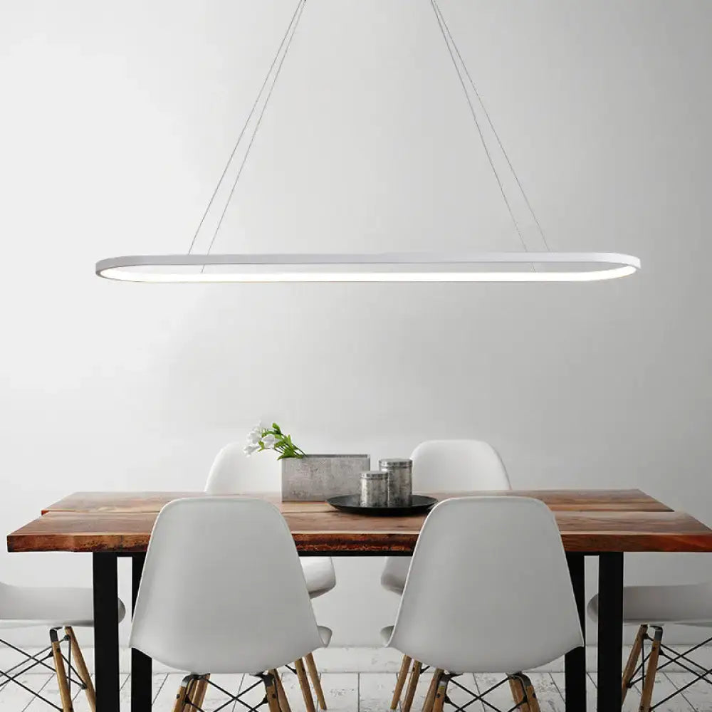Modern white led ellipse hanging lamp with sleek elongated oval design suspended by thin cables for dining table lighting