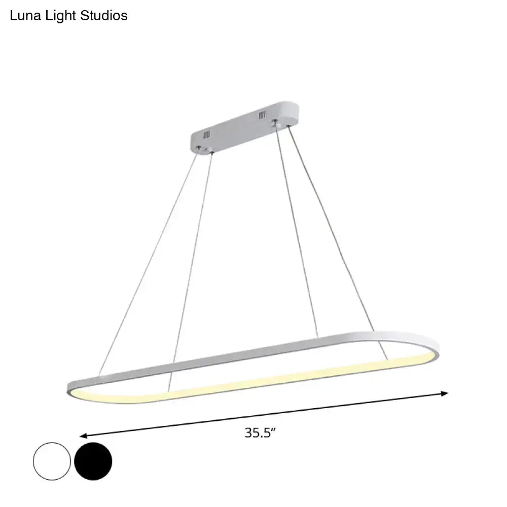 Modern white ellipse hanging lamp with warm yellow led glow from decorbites for dining table lighting