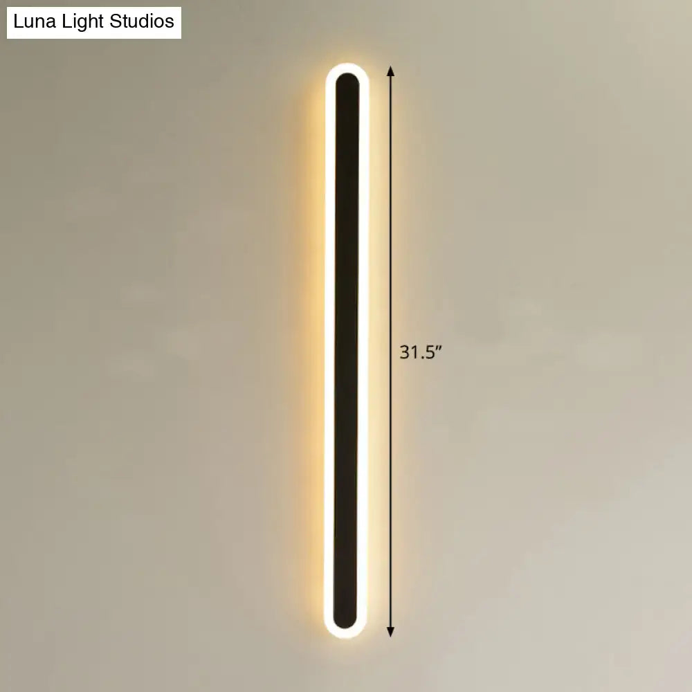 Modern black and white elliptical acrylic wall sconce with a sleek 31.5 inch tall elliptical acrylic flush design and warm white light strip