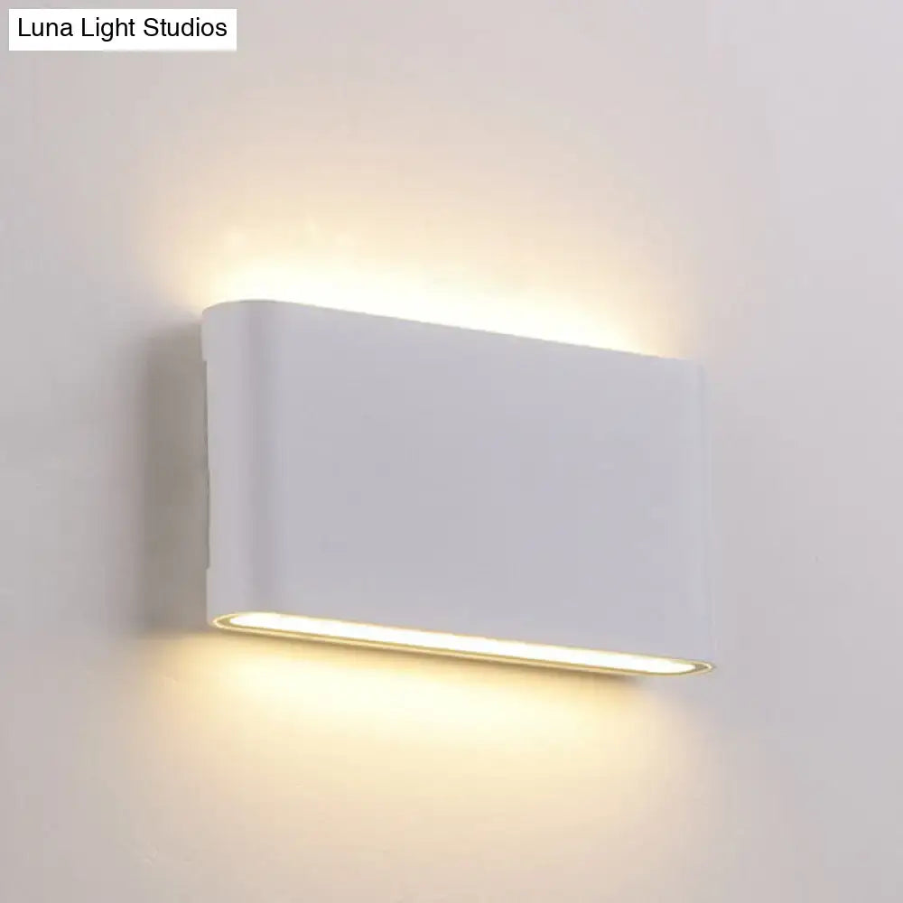 Modern black and white flush mount wall lamp with sleek white rectangular sconce light providing warm ambient lighting