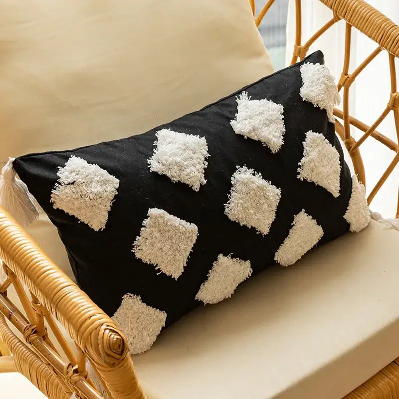 Modern black and white geometric embroidered cushion cover with fluffy tassel diamond appliqués and matching fringe