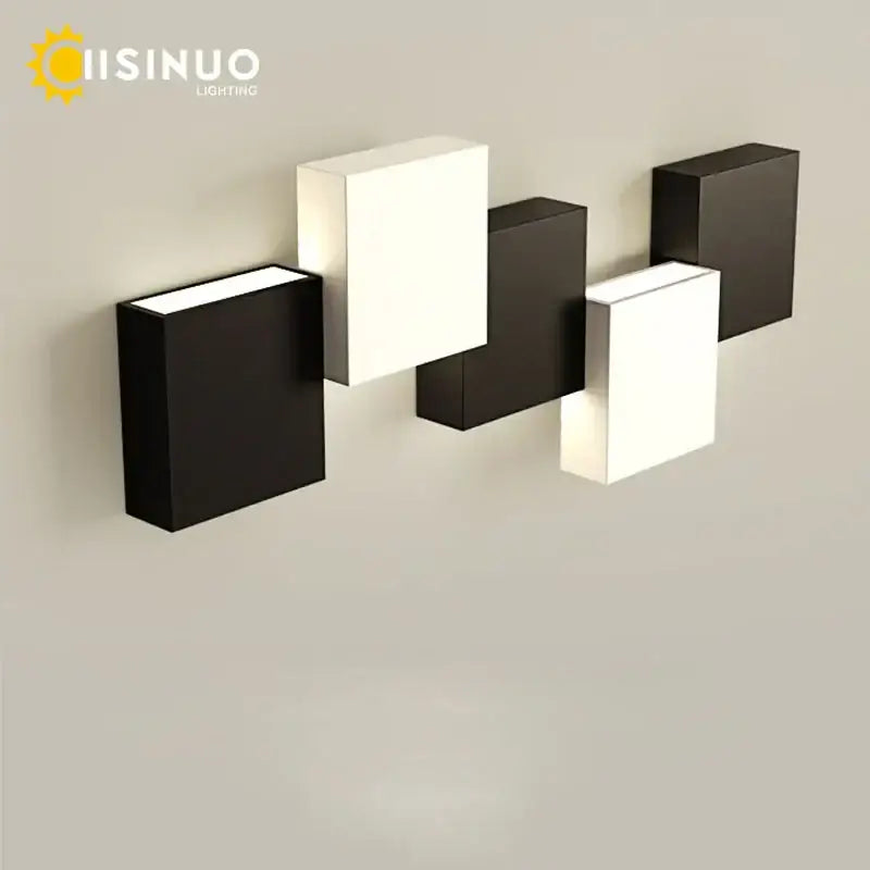 Modern black and white geometric led wall sconce with sleek minimalist design for living room decorbites geometric led wall