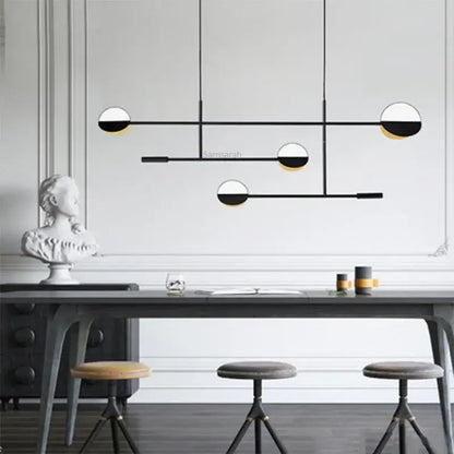 Modern black and white geometric line pendant lamp with gold accents for dining room decorbites geometric line design