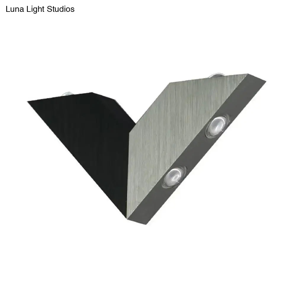 Modern led wall lamp with geometric metal shade featuring a v-shaped brushed metallic finish and two circular lights