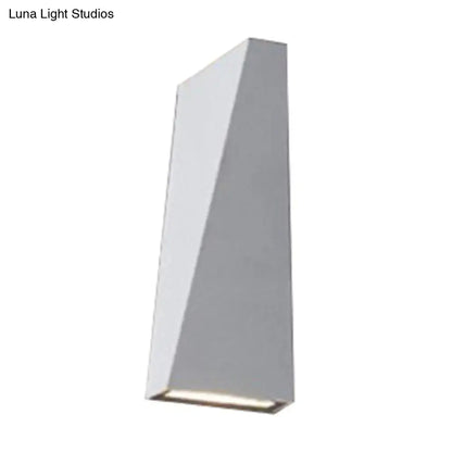 Modern black and white nord wall sconce with geometric angular design and minimalist finish for bedroom wall lamp
