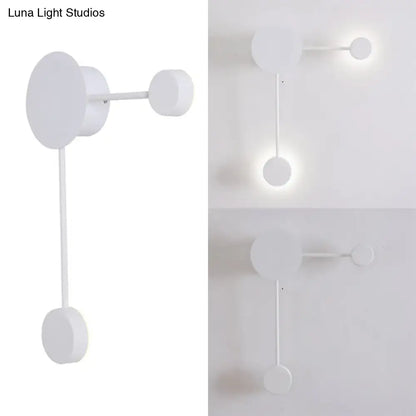 Minimalist white wall sconce with sleek geometric circular elements modern light fixture for living room wall light