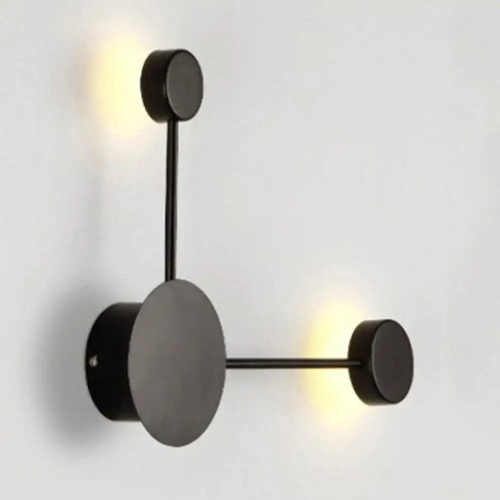 Modern black and white geometric wall sconce with circular design and warm led lighting for living room light fixture