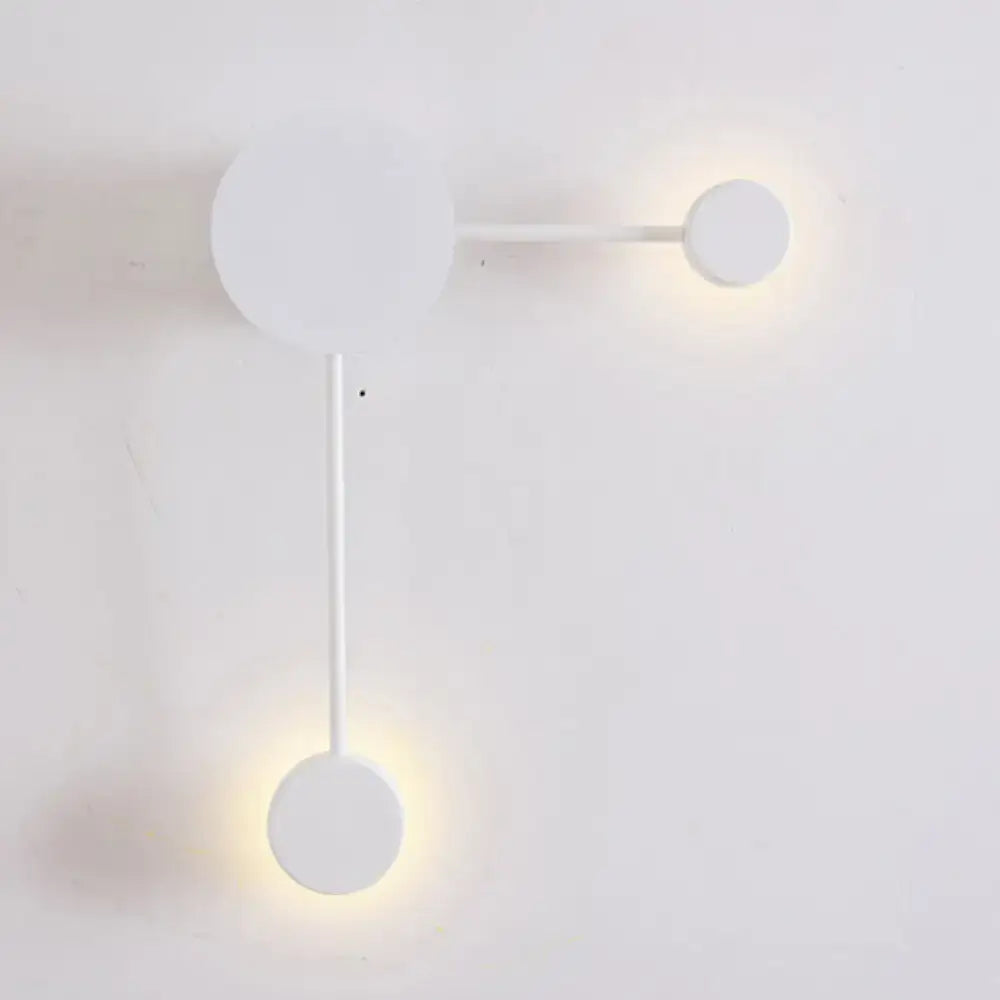 Minimalist black and white geometric wall sconce light fixture with three circular bulbs for living room wall light