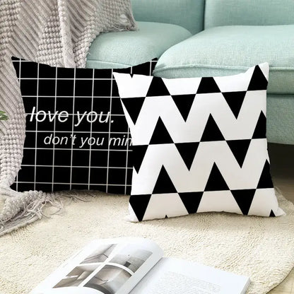 Modern black and white geometry letters cushion cover featuring black and white geometric patterns for home decor