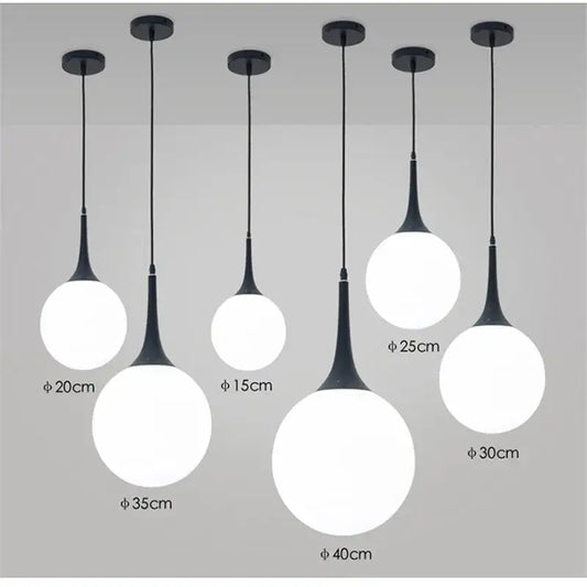 Modern black and white glass ball led pendant lights with sleek black metal stems for living room decorbites pendant lights