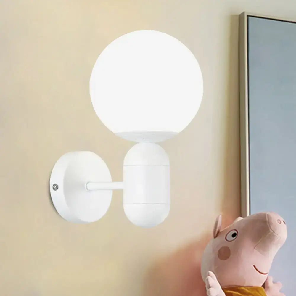 Modern black and white glass wall light featuring a white spherical matte glass wall lamp for meeting rooms