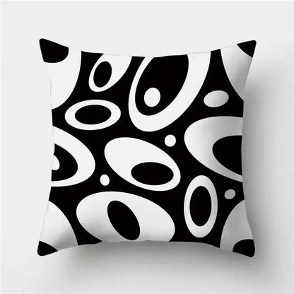 Modern black and white abstract oval patterned throw pillow featuring decorbites geometric stripes pillowcase design