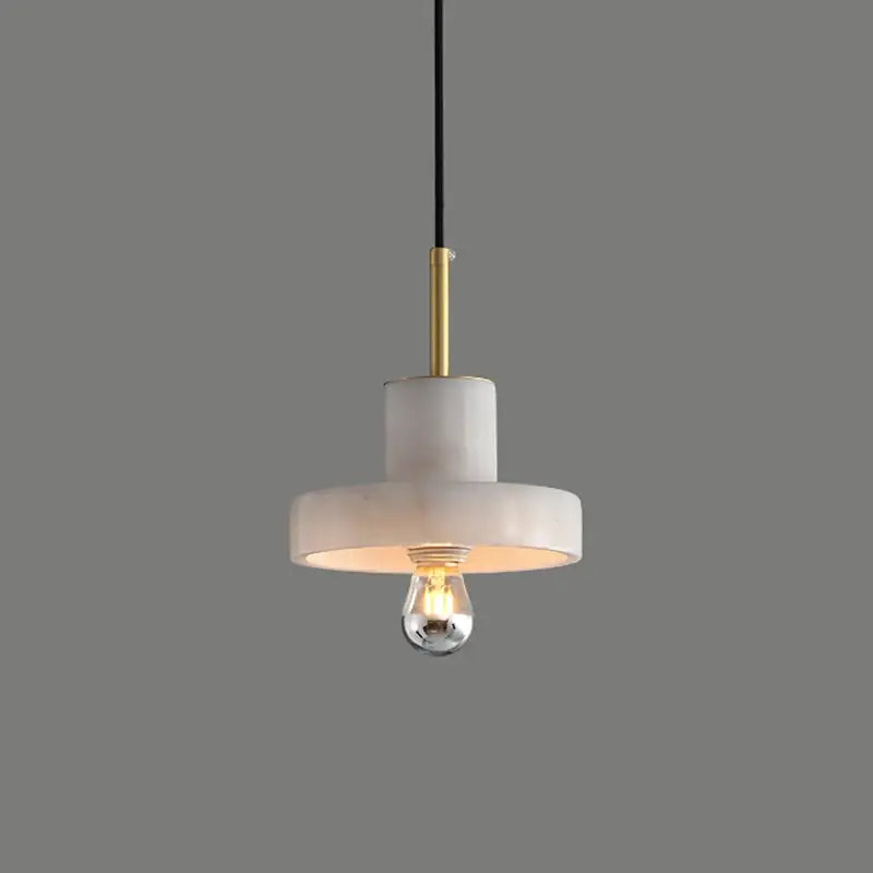 Modern black and white green marble pendant light with gold accents and exposed edison bulb for dining room decorbites green marble