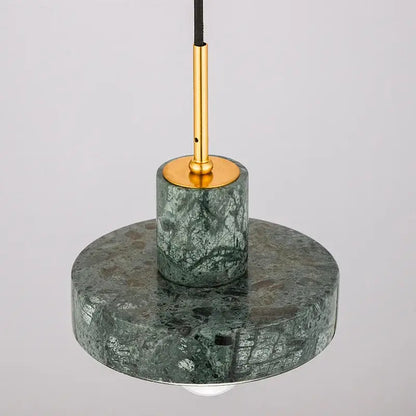 Modern black and white green marble pendant light with gold-toned metal stem and circular base for dining room decorbites green marble
