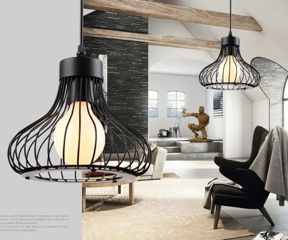 Modern black and white iron cage pendant light with a warm glowing bulb ideal for kitchen decor featuring decorbites iron cage design