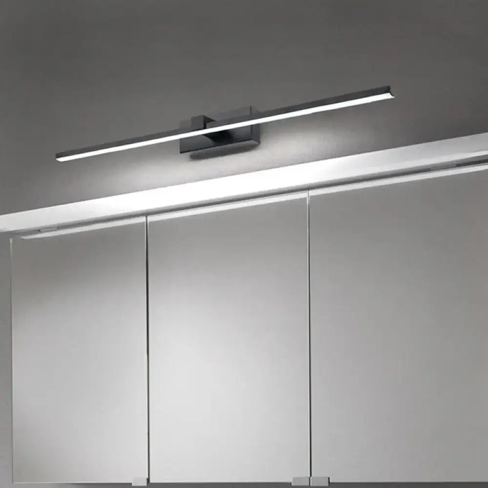Modern black and white iron stick led mirror light bathroom lamp with chrome-finished bulb base mounted above cabinets