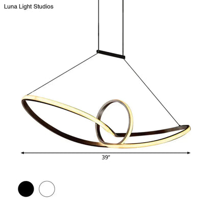 Modern DecorBites™ metal knotting island pendant with two interlocking rings in brushed gold and matte black