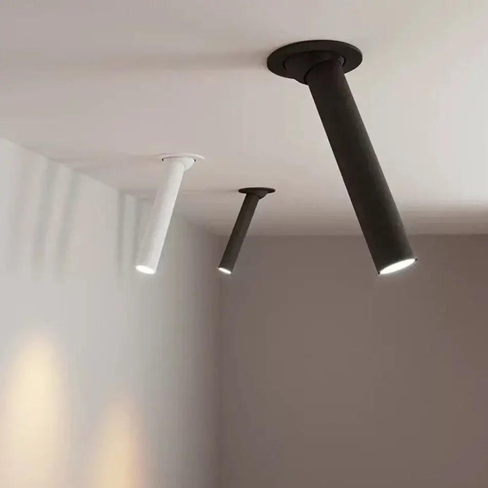 Modern black and white led bar ceiling spotlight with minimalistic cylindrical design and sleek metallic finish