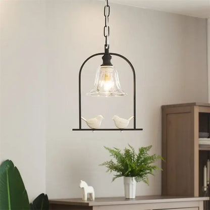 Modern black metal birdcage pendant light with clear glass shade and white ceramic birds for decorbites led bird wall use