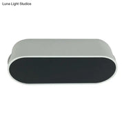 Modern black and white led flush wall lamp with metal shade featuring a sleek white casing and smooth black inner panel