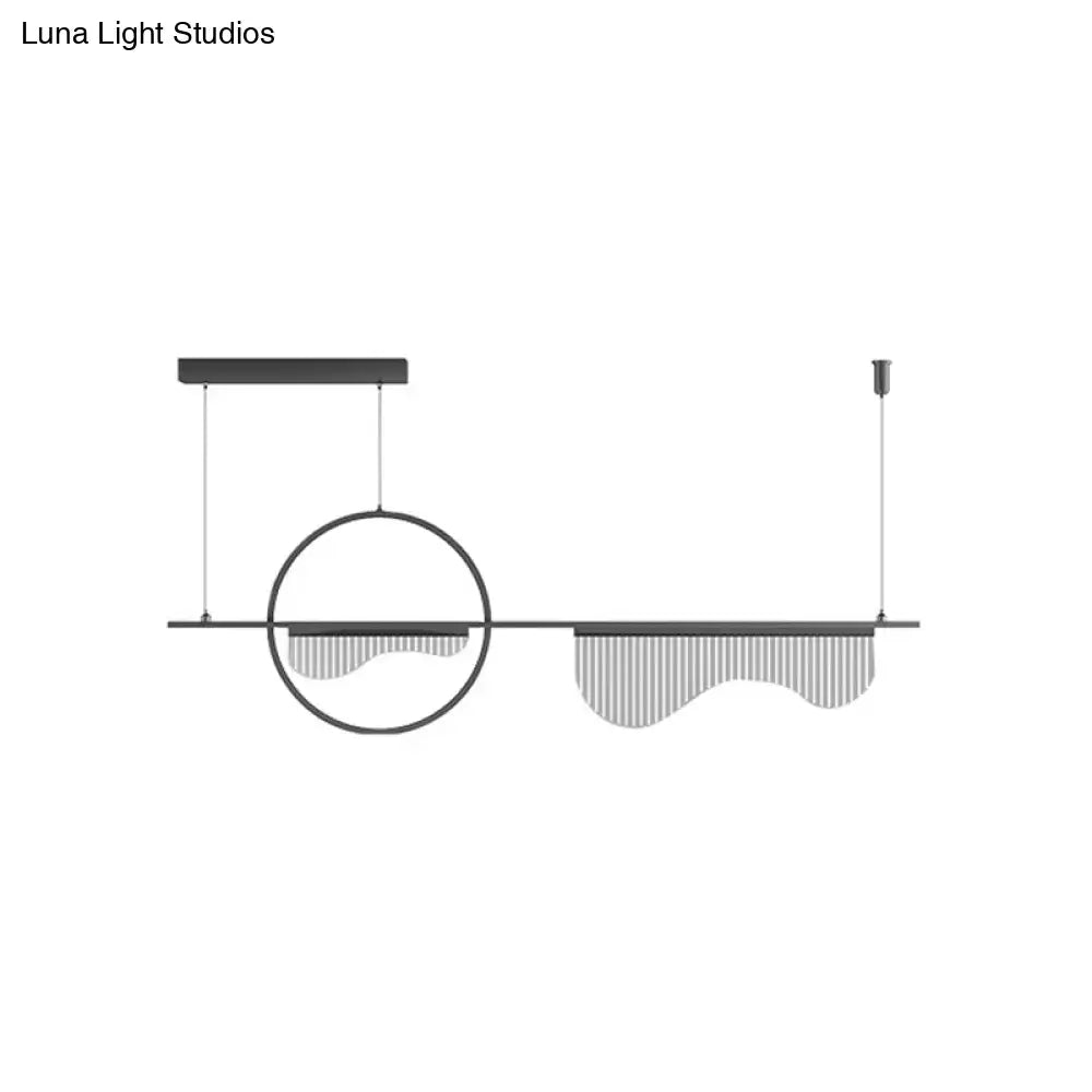 Modern minimalist decorbites island pendant with sleek black metal frame and cascading frosted glass shades for contemporary lighting
