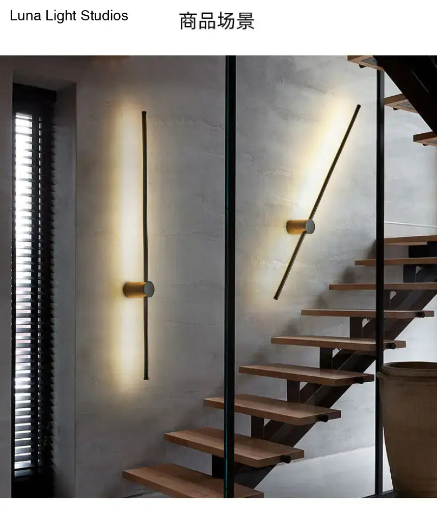 Modern black and white led metal wall sconce with slender gold rods and brass bases for indoor lighting