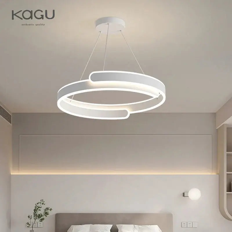 Modern black white led ring chandelier pendant light with sleek overlapping circular rings for living room decorbites black white